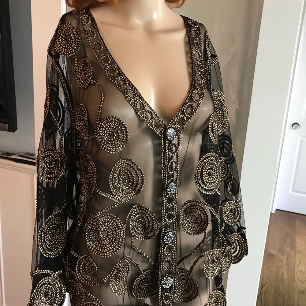 New with tags. Stunning First Choice jacket. Received as a gift.. never wore.